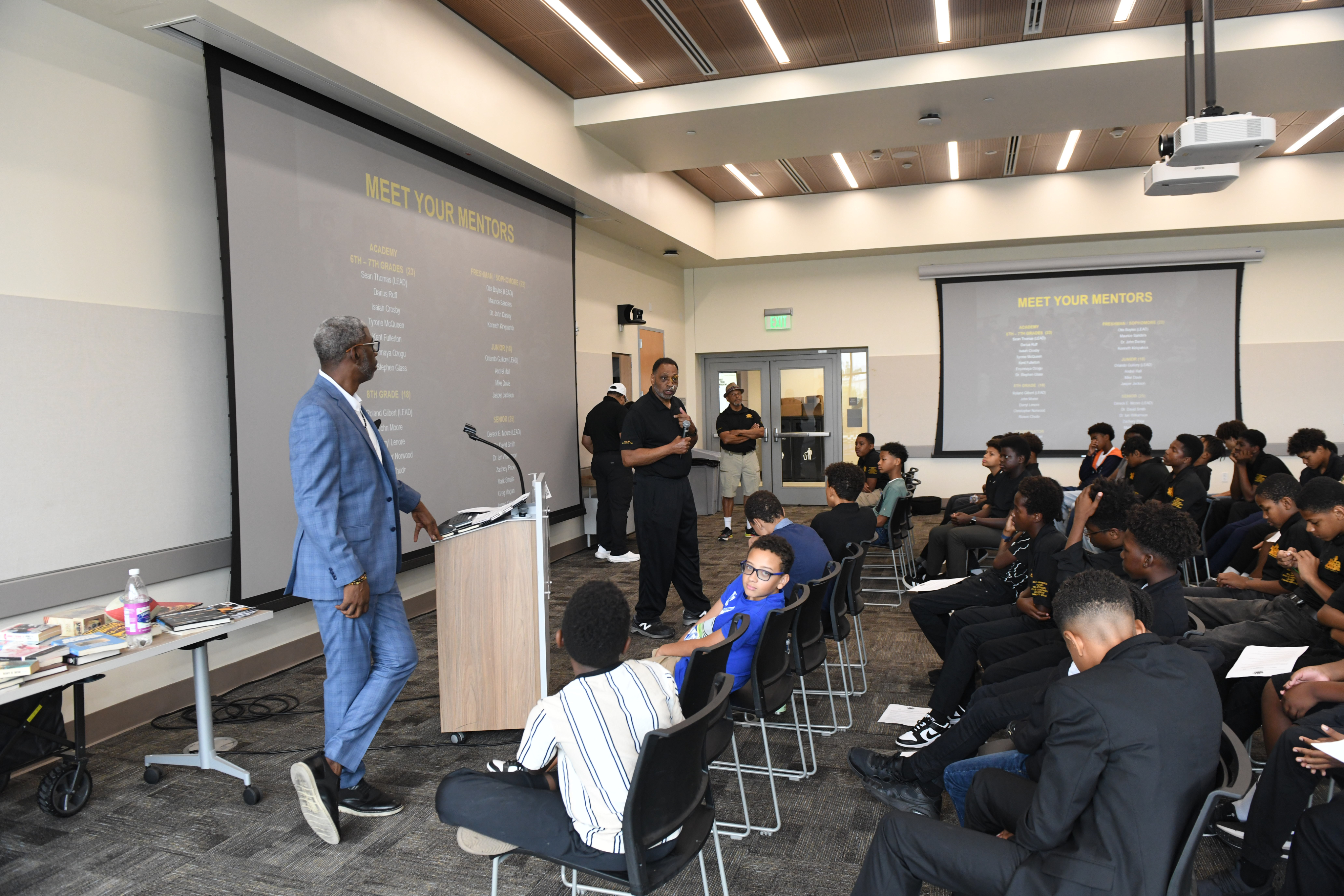 Presentation 'Meet Your Mentors' occurring in large hall